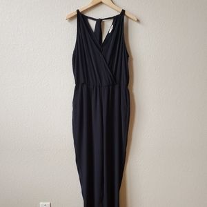 Long black jumpsuit plunging v neck tie back sz 4